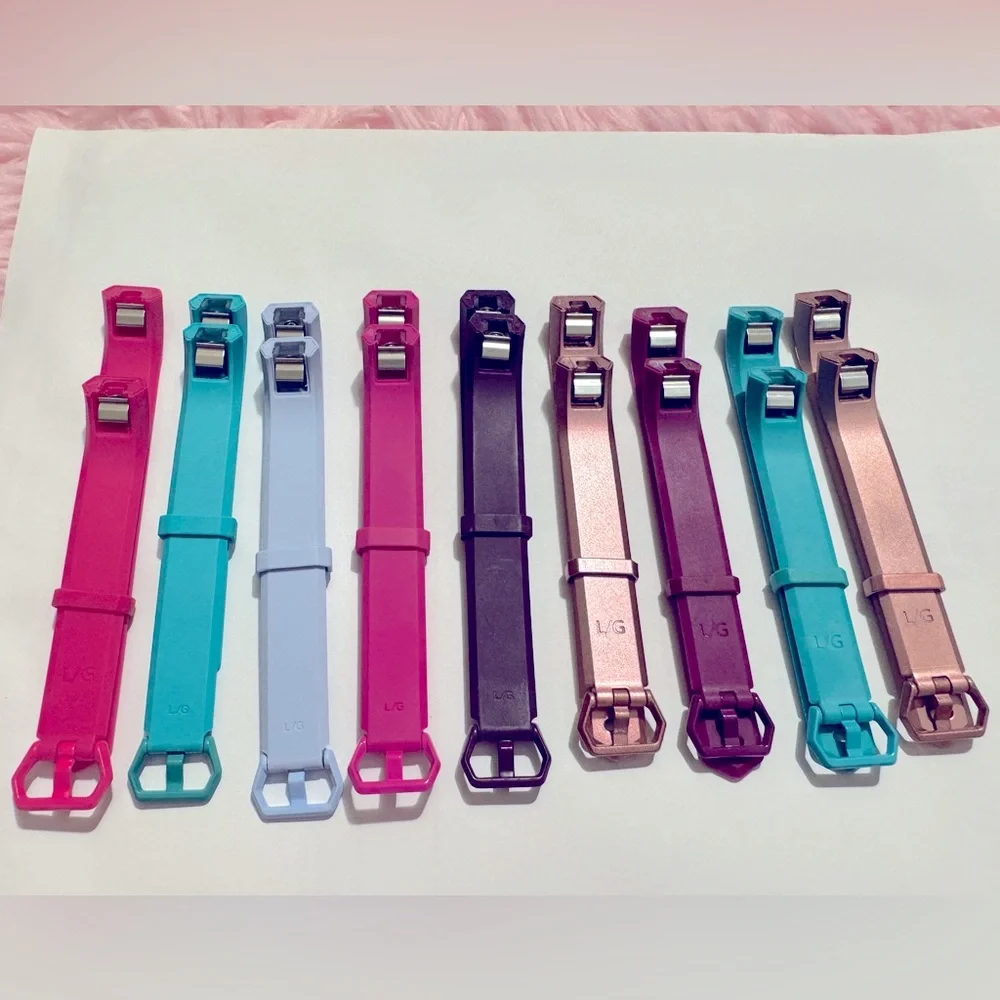 9 Fitbit Alta bands various colors. Size large. Compatable w/ only Fitbit Alta.
